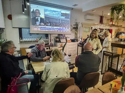 Locals gather for red wine spritz and conclave watch in a cardinal's hometown