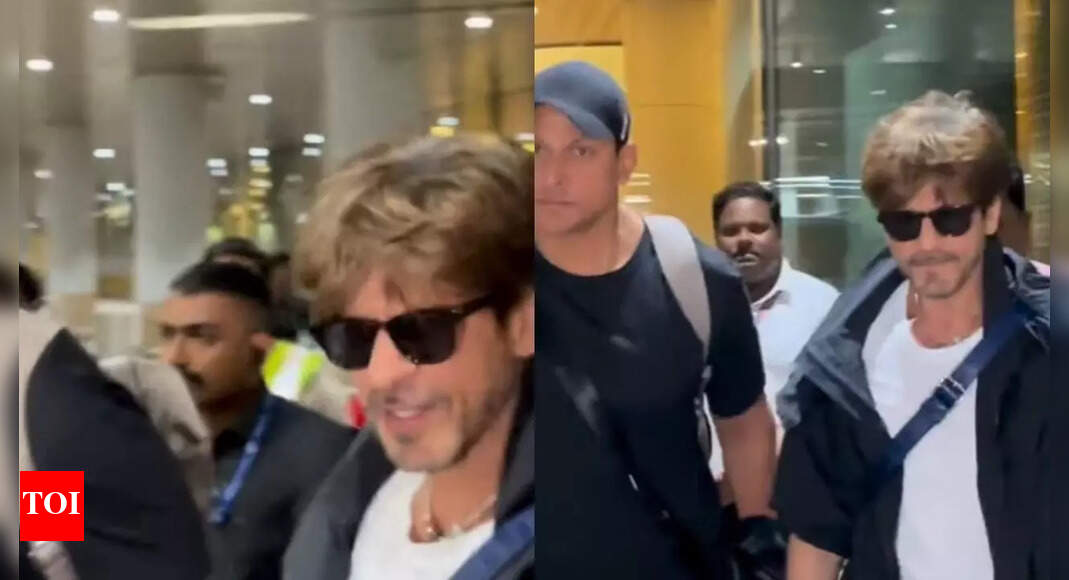 SRK smile at paps as he arrives Mumbai post Met Gala debut