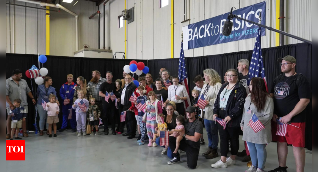 First batch of white South African refugees land in US  as Trump cites ‘racial discrimination’ - Times of India