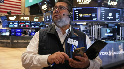 Wall Street opens lower as wholesale prices drop, oil slumps amid US-Iran deal hopes