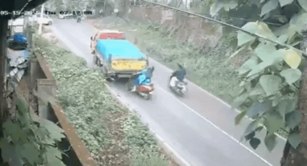 Close call: Truck rolls back, woman survives horrific crash by inches