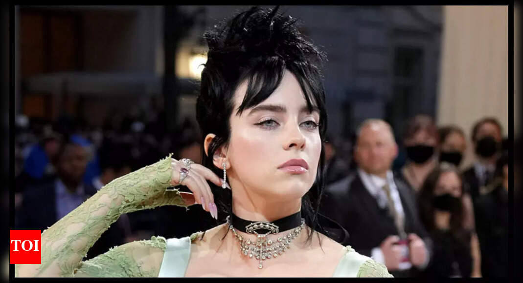 Billie Eilish calls out fans for getting fooled by AI-generated images of her at the MET Gala: 