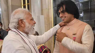 PM Modi and Neeraj Chopra (PTI Photo) 'India is elated and proud': PM Modi congratulates Neeraj Chopra for breaching 90m mark at Doha Diamond League