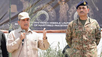 <p>Pakistan PM Shehbaz Sharif with Pak army chief Asim Munir<br></p> Sharif admits Nur Khan base was struck: ‘Munir rang me up at 2.30am’