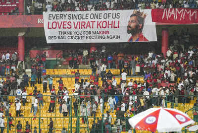 Bengaluru: Fans of Royal Challengers Bengaluru's Virat Kohli holds a large banner in his honour after he recently announced retirement from the test cricket, as spectators leave after the Indian Premier League (IPL) 2025 T20 cricket match between Royal Challengers Bengaluru and Kolkata Knight Riders was abandoned without a ball bowled due to rain, at the M Chinnaswamy Stadium, in Bengaluru, Karnataka. (PTI Photo/Shailendra Bhojak) 'Letting go is not appreciated in our country': Ex-India batting coach makes a huge claim about Virat Kohli's retirement