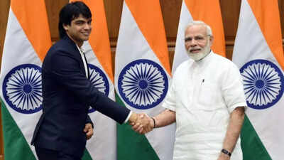 Neeraj Chopra and PM Modi (Photo Credit: @DDIndialive on X) Neeraj Chopra reacts to PM Modi’s special message after historic 90m throw at Doha Diamond League