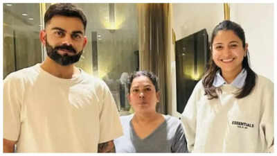 Virat Kohli and Anushka Sharma looks cosy and cheery in a NEW pic with fan