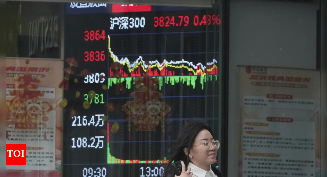 World shares advance after China cuts interest rates to boost economy