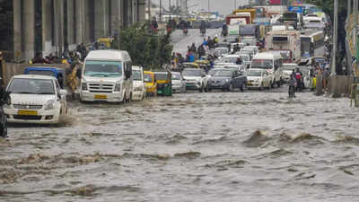 (Photo credit: PTI) BJP hits out at Congress in Karnataka for celebrating 2 years in office amid Bengaluru floods