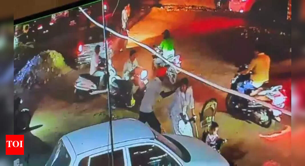 Gold chain snatched from woman in crowded mkt; bystanders look on ...