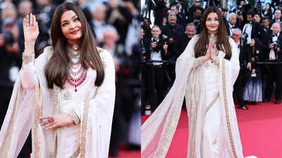 Netizens say 'Mama slammed divorce rumours', call her an icon and compare her with Rekha as Aishwarya Rai Bachchan stuns in an ivory saree and sindoor at Cannes 2025 - WATCH VIDEO