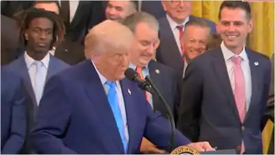  Trump jokes about son Barron's height at celebration for NCAA champs