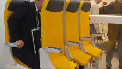 What are standing seats in planes and what is their purpose?