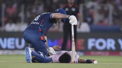 Arshad Khan went down in a heap during the match between Gujarat Titans and Lucknow Super Giants. (AP) WATCH: Scary scenes in GT vs LSG as Arshad Khan collapses twice during run-up