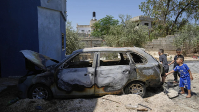 Burnt cars, shattered homes: Israeli settlers attack Palestinians in Bruqin