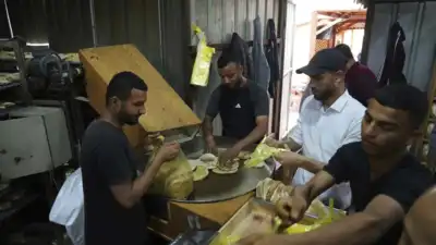 Israel may change tack to allow aid groups in Gaza to stay in charge of non-food aid
