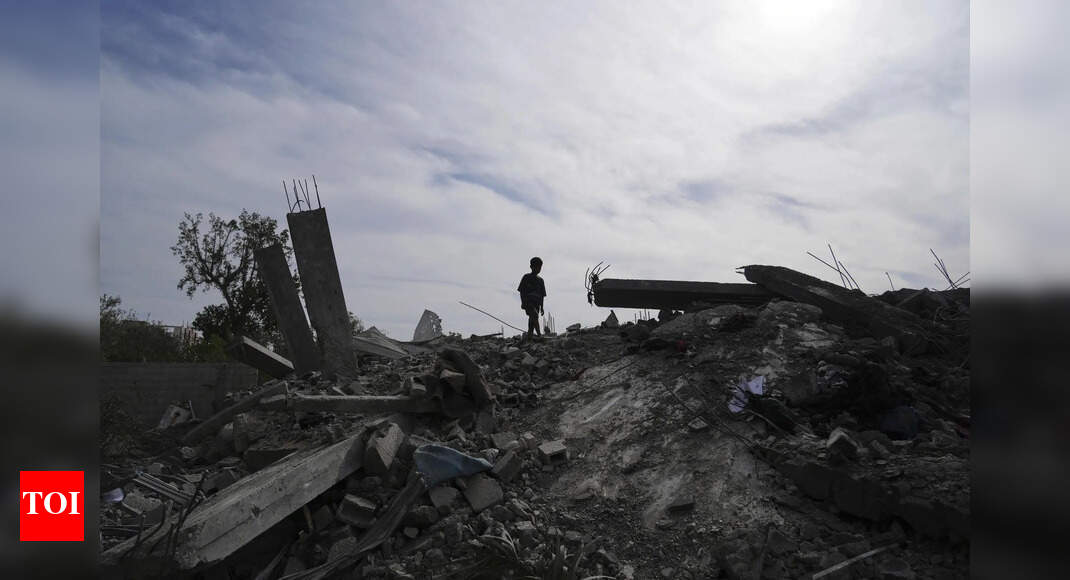 Nine of a doc's 10 kids killed in Israel airstrike - Times of India