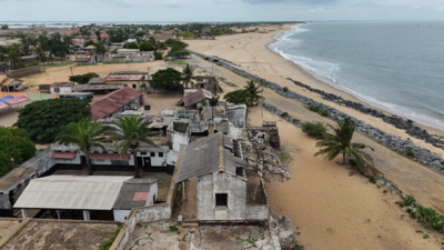 Along Ghana's vanishing coast, climate change swallows history, homes