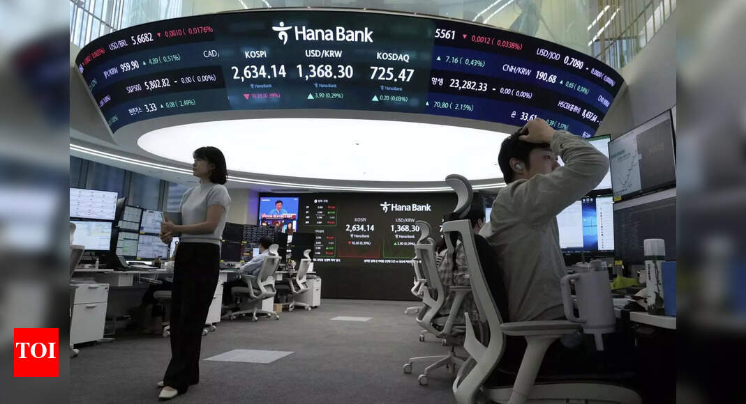 Global markets were mixed, but the FTSE 100 and Hang Seng rose after Trump postponed EU tariffs. US futures surge ahead of consumer data. | Business – Times of India