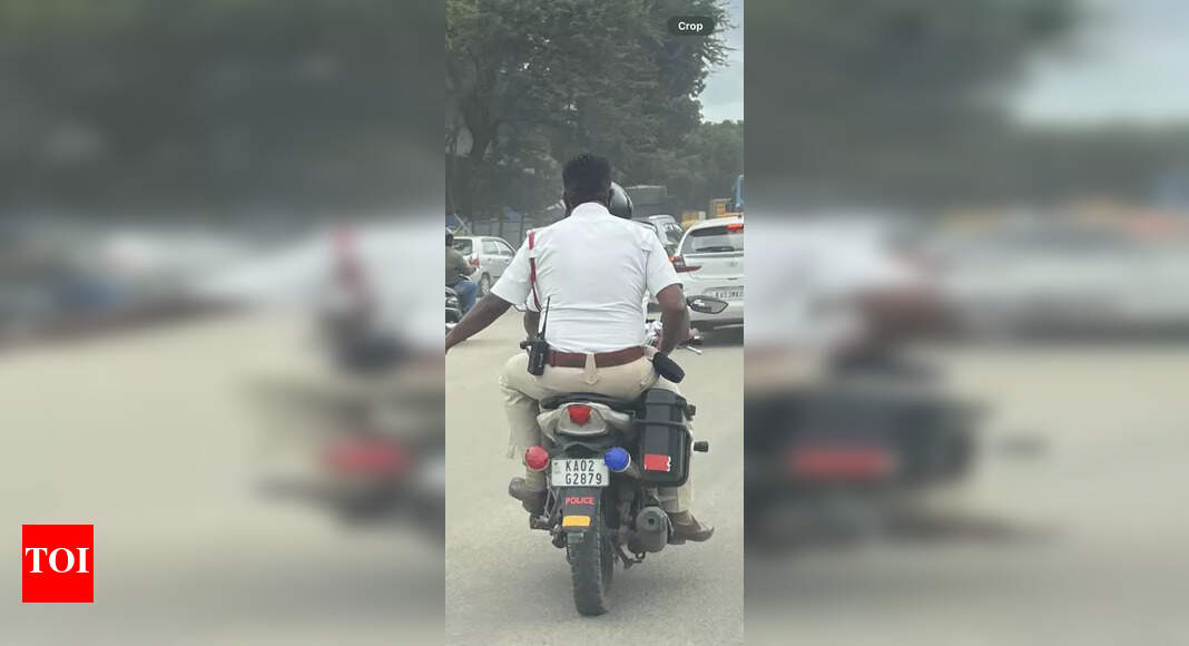 Bengaluru traffic cop fined Rs 500 for riding without helmet