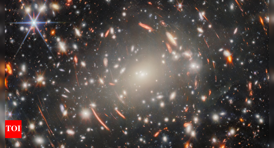 Glowing streaks of light and warped arcs: Nasa gives glimpse at ‘distant past’ through new Webb picture