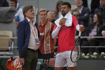 Novak Djokovic trades his racket for a bicycle and takes a nighttime ride around Paris