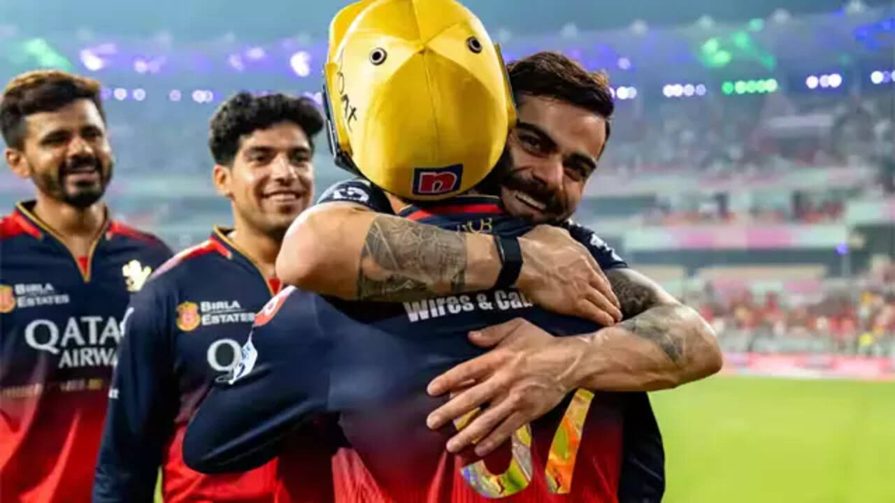 One more to go! Virat Kohli hugs teammates, signals just one win away from IPL  glory – Watch | Cricket News - Times of India