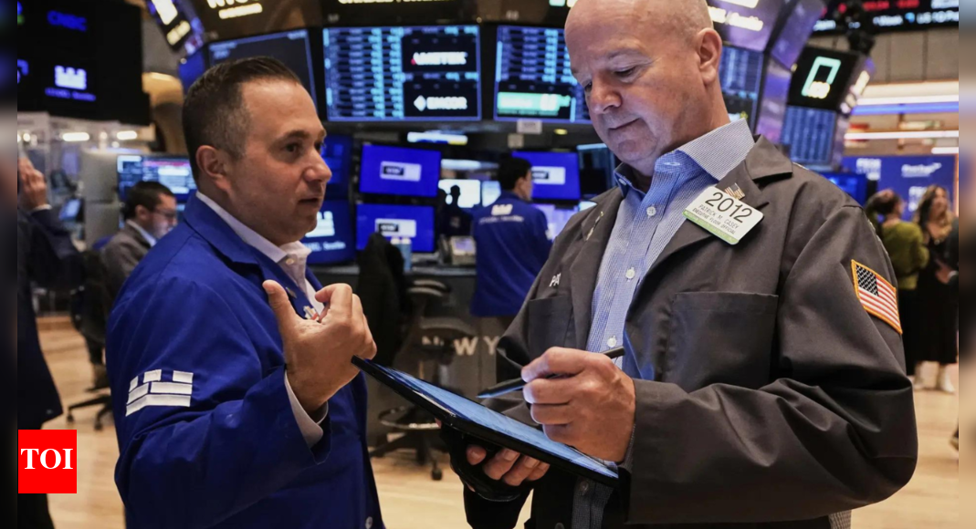 Wall Street slips as tariff concerns weigh on earnings, inflation data in focus