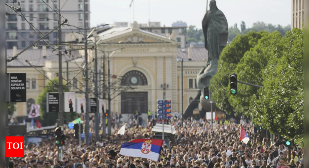 Thousands rally in Serbia's capital demanding snap elections after months of protests