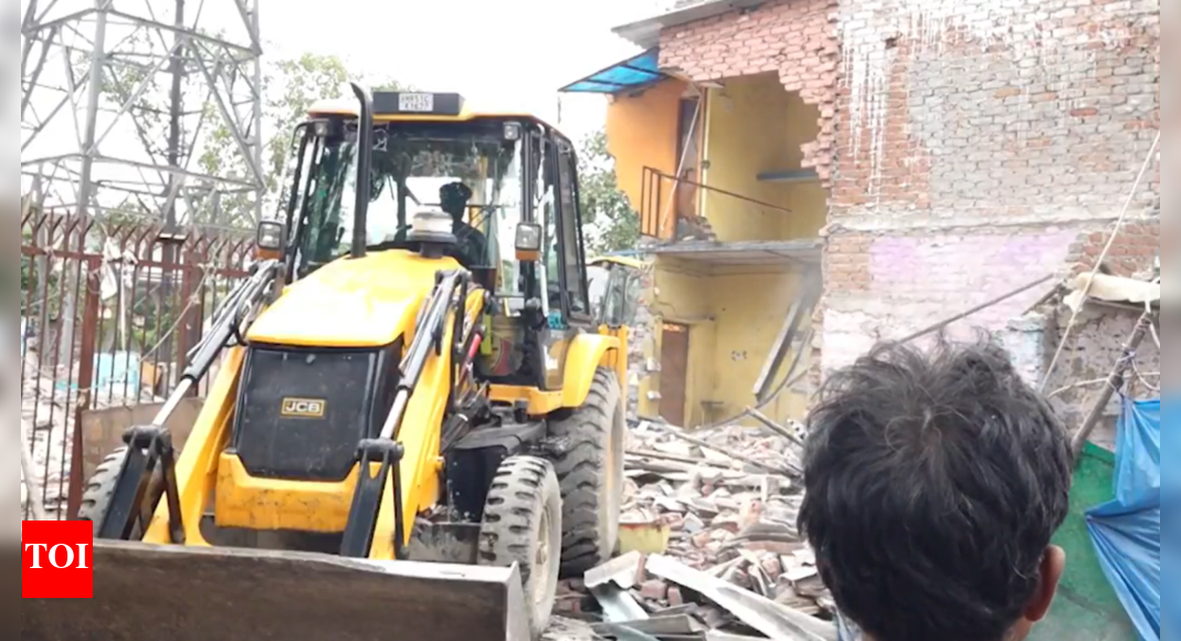Demolition drive underway at Jangpura’s Madrasi Camp after Delhi HC order to clear slums