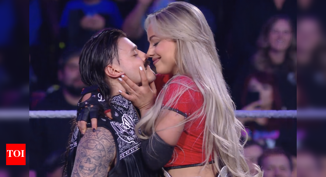 WWE Stars Liv Morgan and Mysterio Share Kiss at Netflix Event