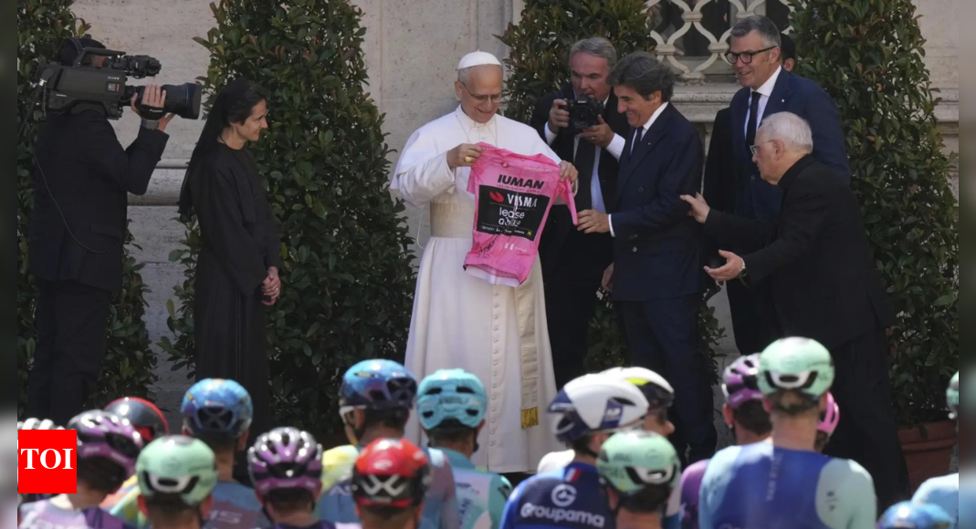 Pope Leo XIV blesses cyclists competing in the Giro d'Italia as final stage enters Vatican gardens