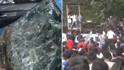 RCB celebrations turn chaotic: Fans climb over car, crush vehicle - Video