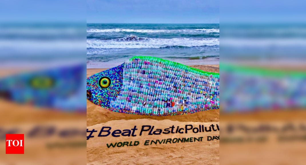 Sand Artist Creates Message on Environment Day