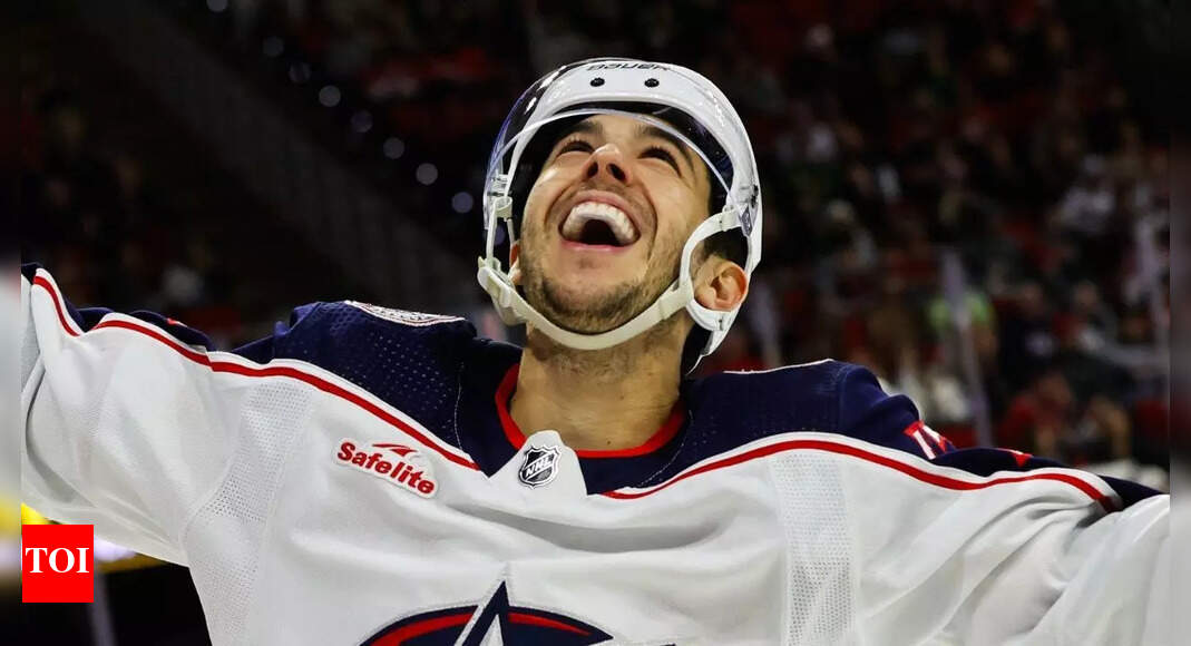 Monahan Receives Masterton Trophy from Gaudreau's Wife