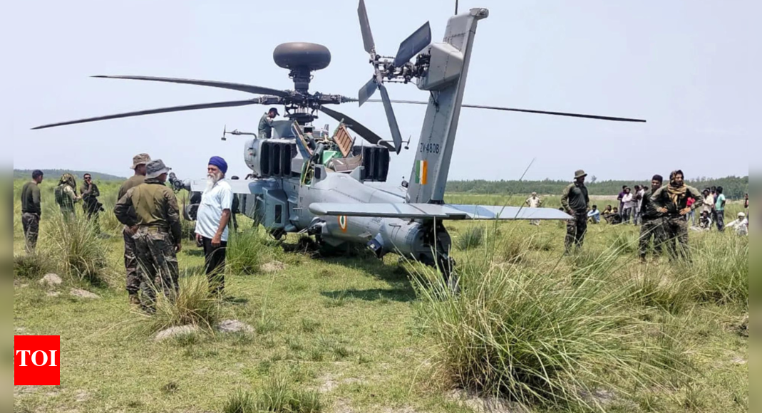 Apache lands safely after mid-air snag