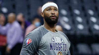 Former NBA star DeMarcus Cousins held by Police after fans threw beer and food at him on his way to locker room