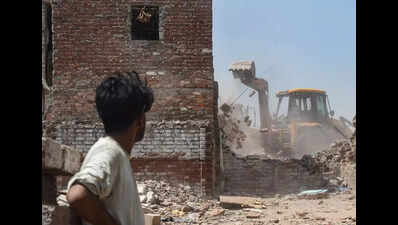 AAP slams demolition in Bhoomiheen camp, DDA defends action
