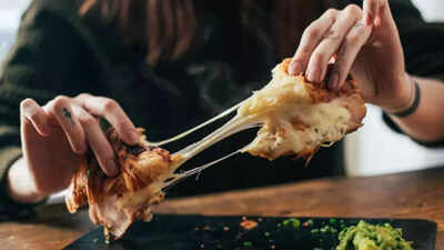 5 signs you are eating too much cheese