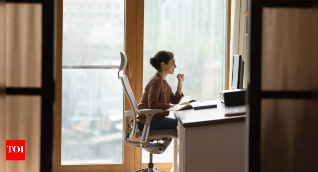 What your sitting style in the office says about your professional power and leadership potential