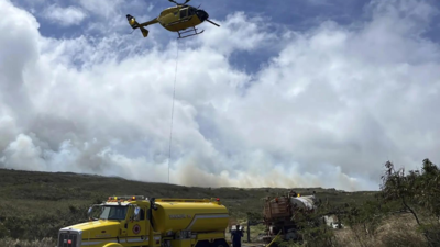 Fast-moving brush fire on Hawaii's Maui island evacuates about 50 people. No structures have burned