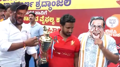 BJP workers wear CM masks, carry IPL trophy replica in protest over Bengaluru stampede; police detain several at Freedom Park