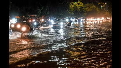 Roads flood, traffic slows: Rain reminds city of its annual pain