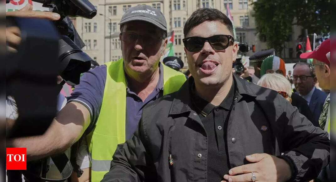 Irish group Kneecap appears in UK court; charged with terror offence over Hezbollah flag; hundreds rally in support outside courthouse