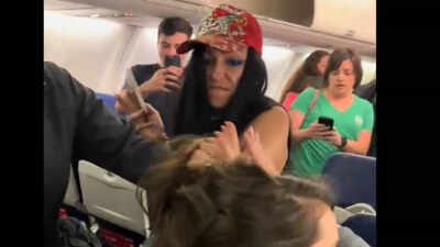 Drunk woman dragged off Southwest flight in New York, grabs passenger's hair; arrested; watch video