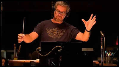'How to Train Your Dragon' music composer John Powell recalls making the music during the Palisades fire; escapes with two poodles and a backup drive