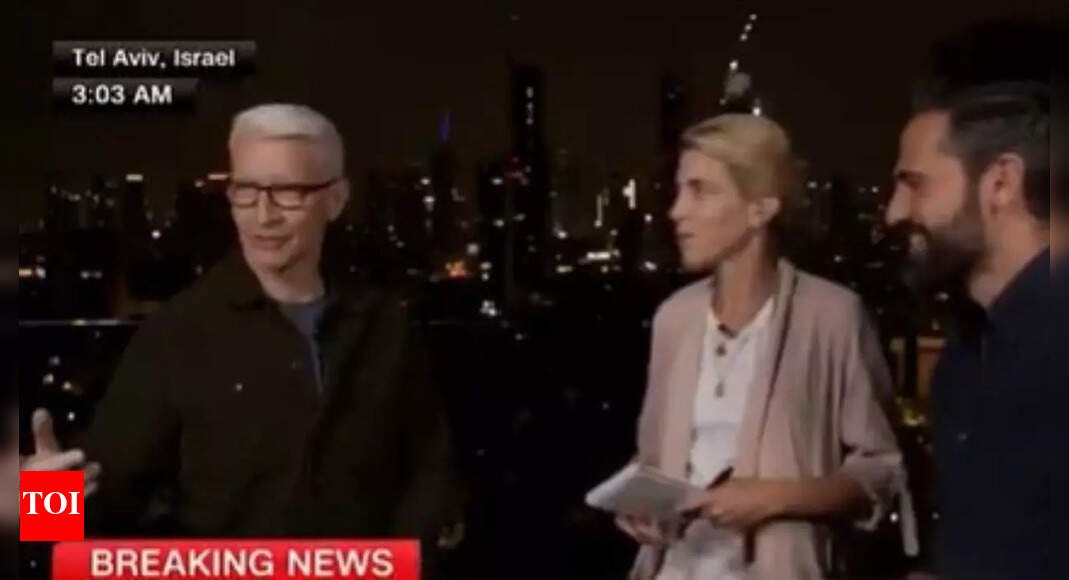 Watch: CNN's Anderson Cooper leaves Tel Aviv hotel studio amid missile alert