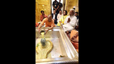 Yogi begins day with visit to KV Temple