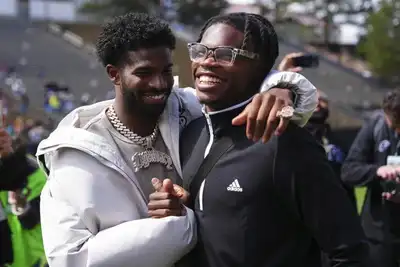  Shedeur Sanders reacts as Travis Hunter lands $46.6M Jaguars rookie deal