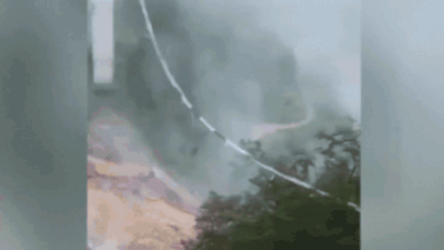  Truck hangs mid-air with driver inside - watch terrifying video